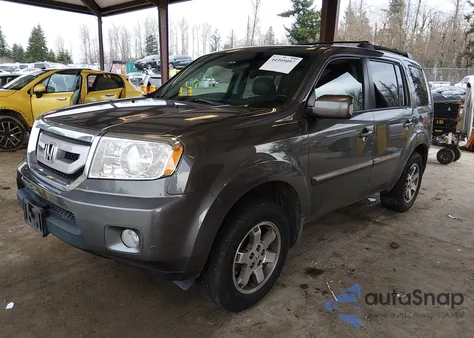 2010 Honda Pilot Touring z USA, uszkodzony, nr VIN 5FNYF4H99AB503539
